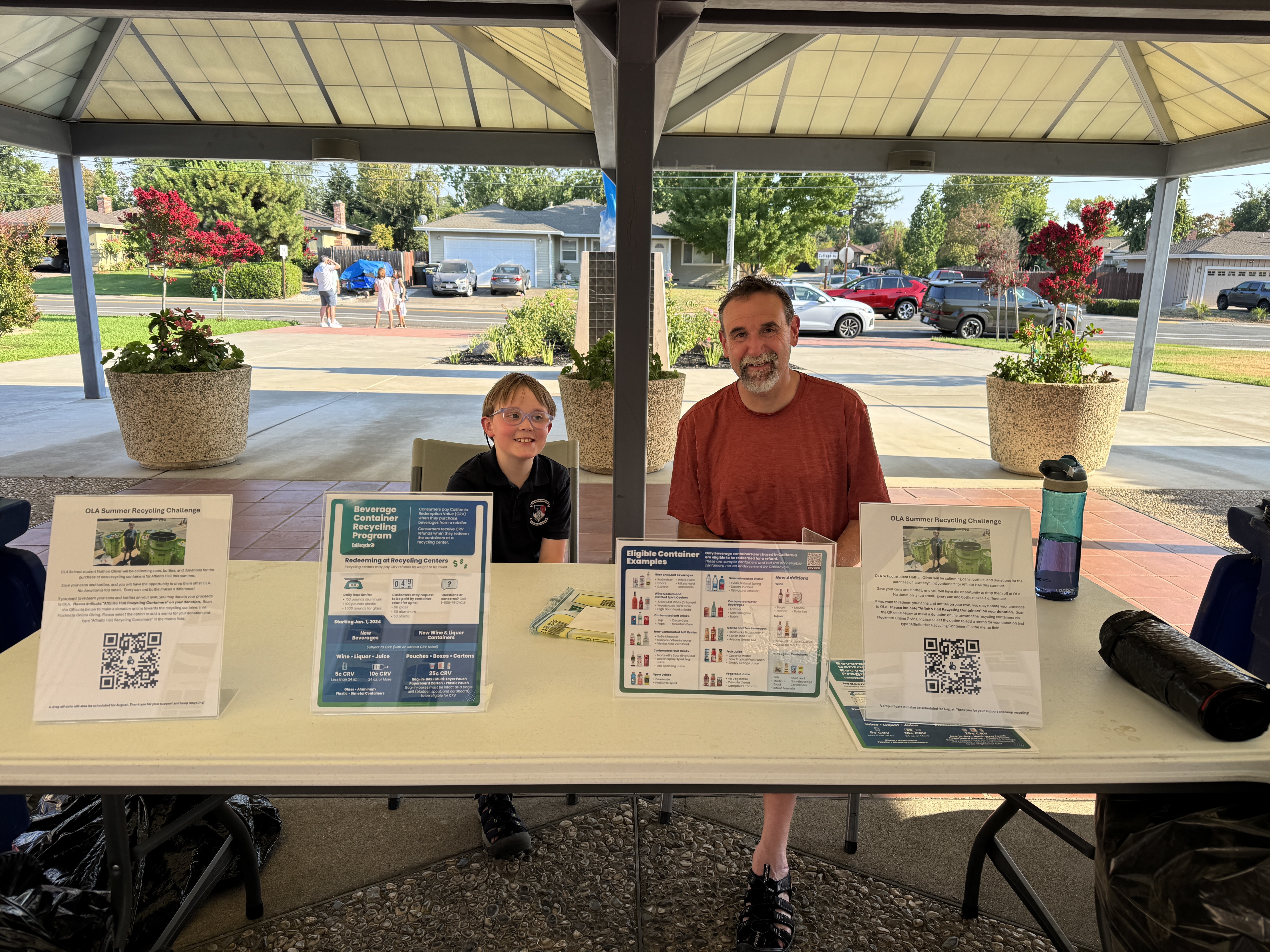 Nathan and his father ready to collect donations.