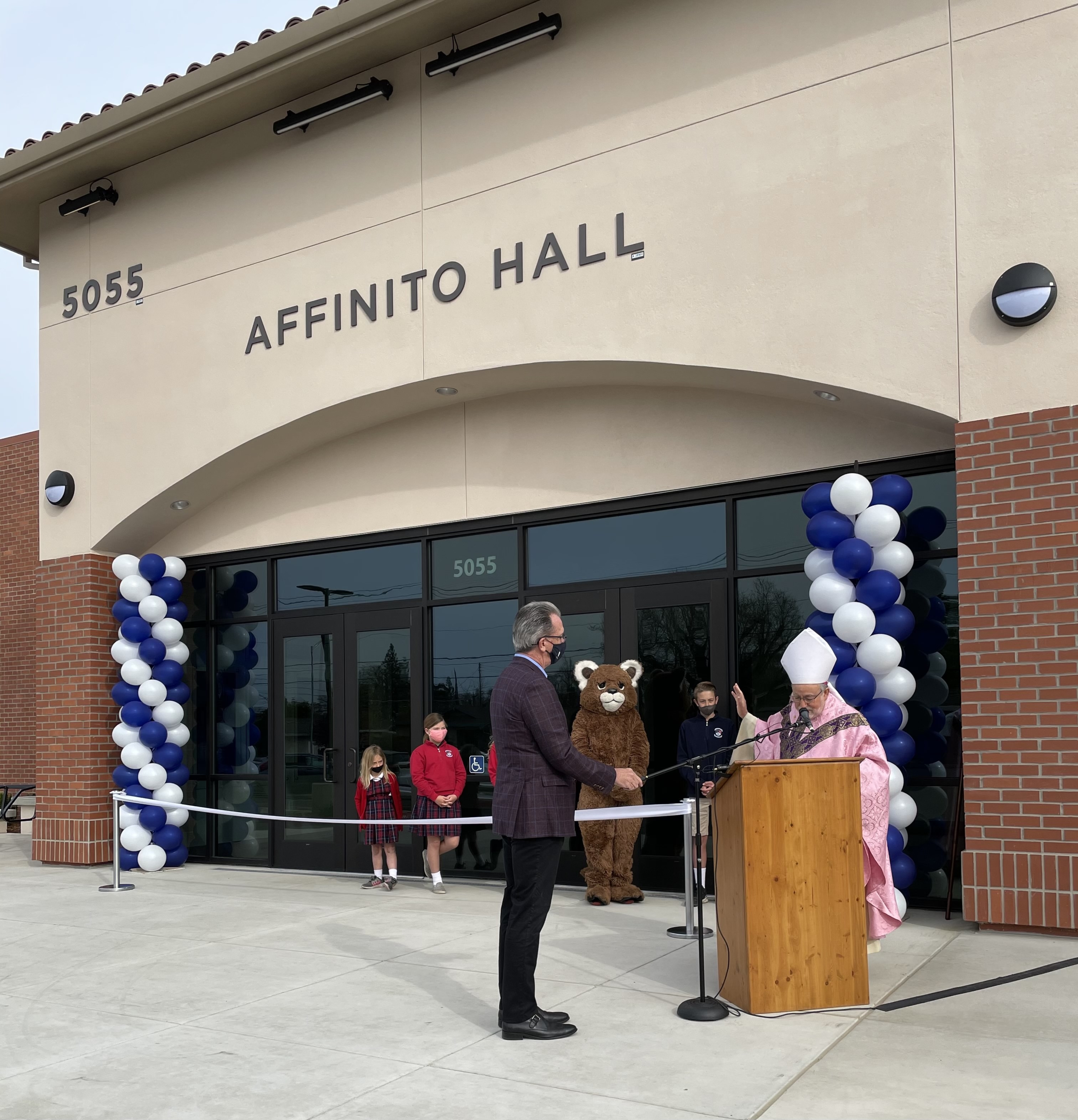 Bishop Soto blesses Affinito Hall.