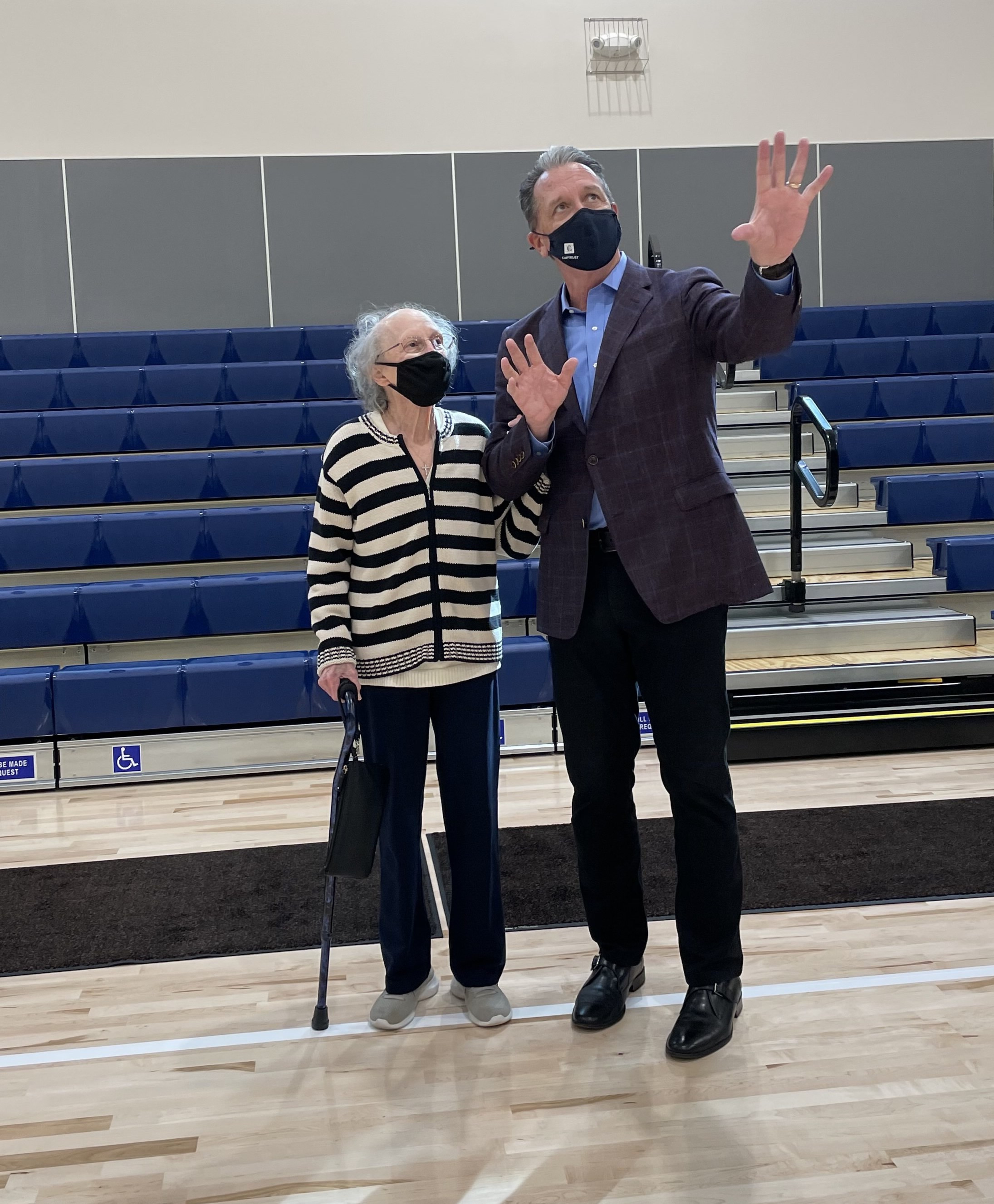 Kelly Brothers and Nancy Affinito admire the new gym and stage.